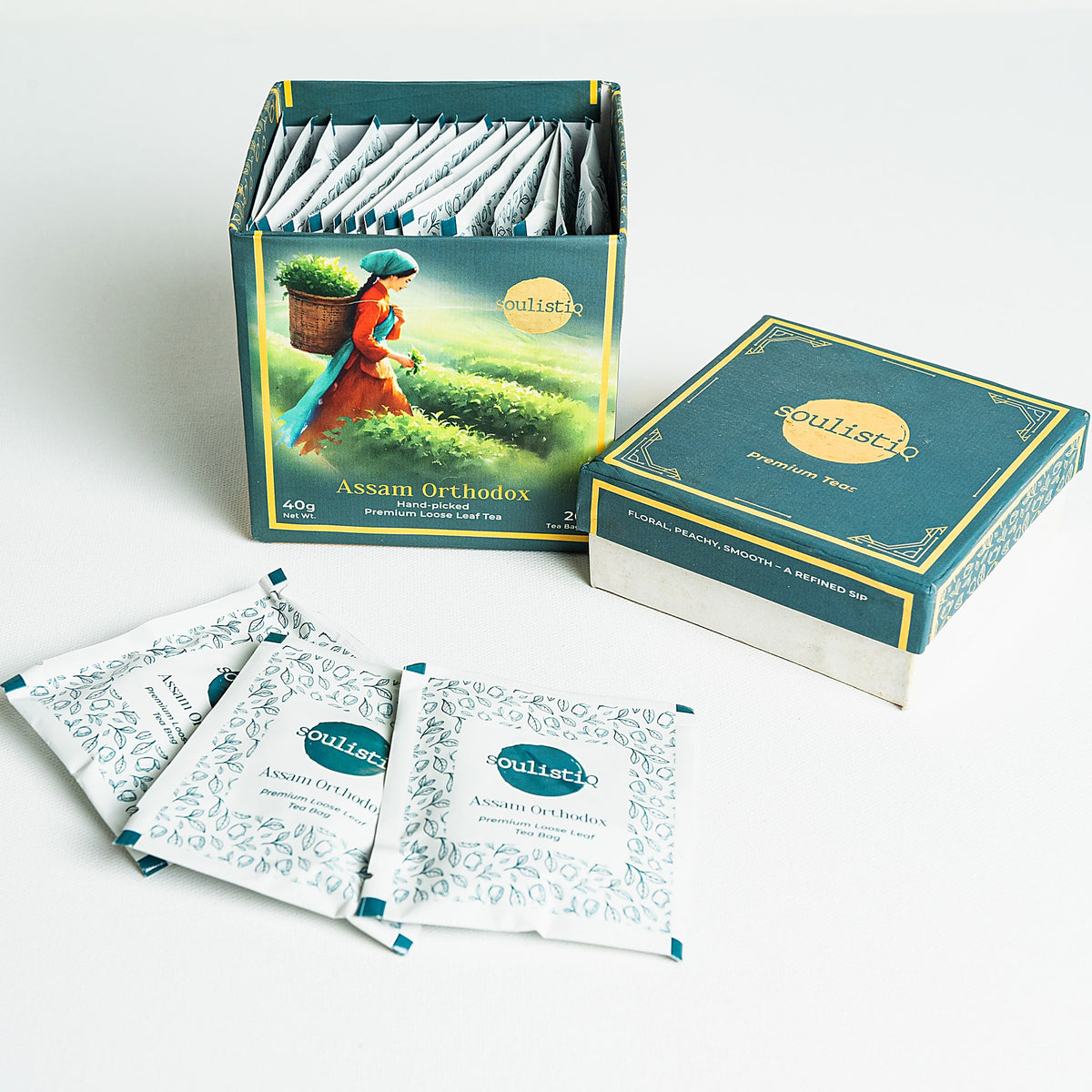 SoulistiQ Assam Orthodox — open box with tea envelopes